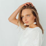 Love First | Ohrringe für €49.99 von So Loved Manufacture