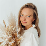 Love First | Ohrringe für €49.99 von So Loved Manufacture